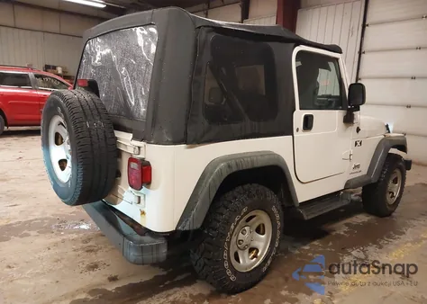 2004 Jeep Wrangler X z USA, uszkodzony, nr VIN 1J4FA39S84P701132